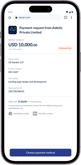 The payer's phone, open at the Skydo payment request: USD 10,000.00 from Aidetic Private Limited, with a Visa and Mastercard card behind it.